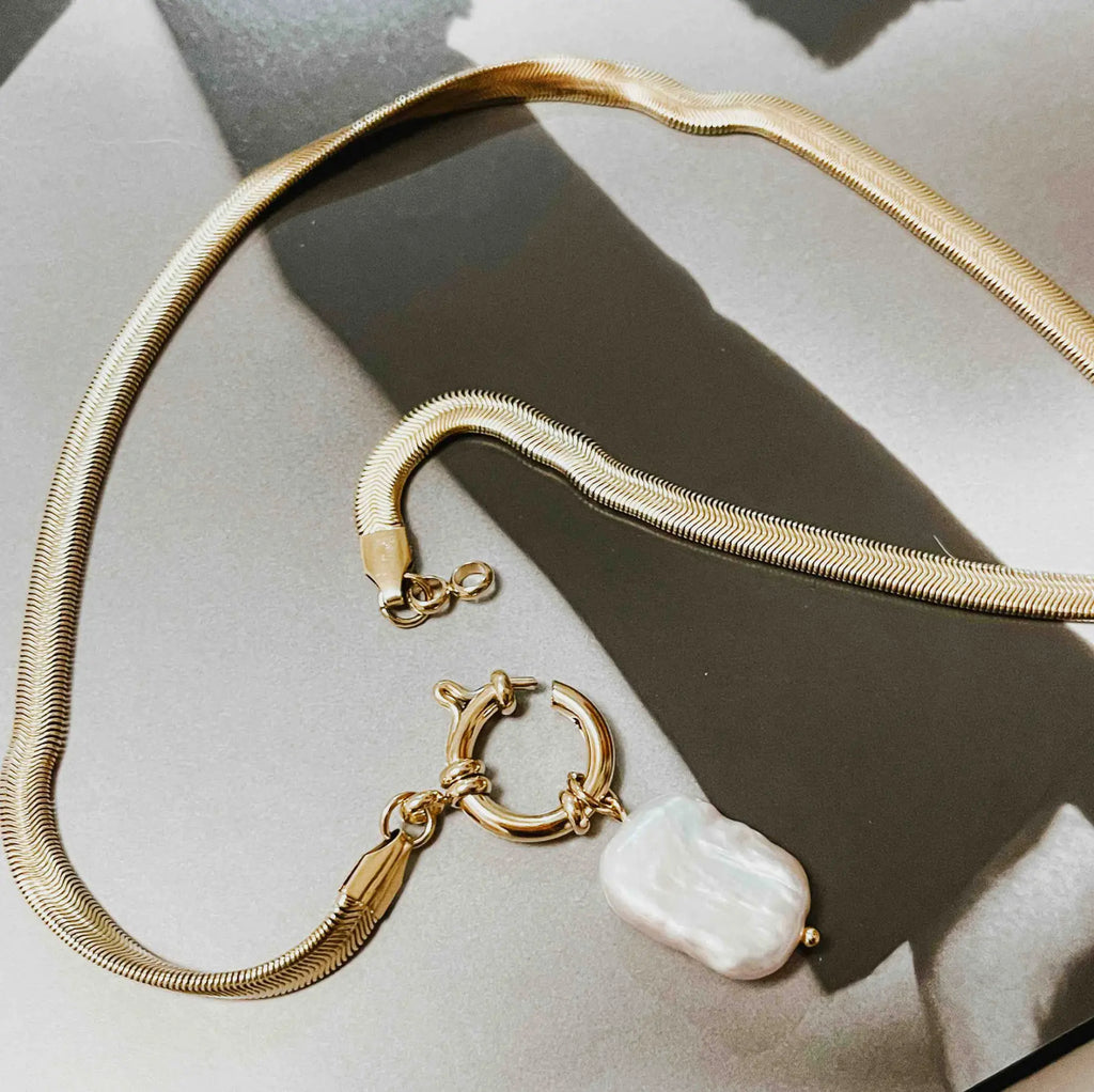 ✨ Golden Pearl Drop Waterproof Necklace